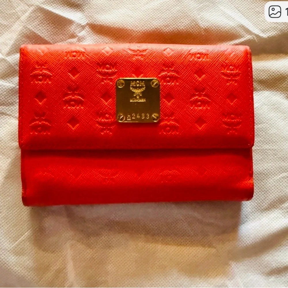 MCM Embossed Leather Compact Wallet